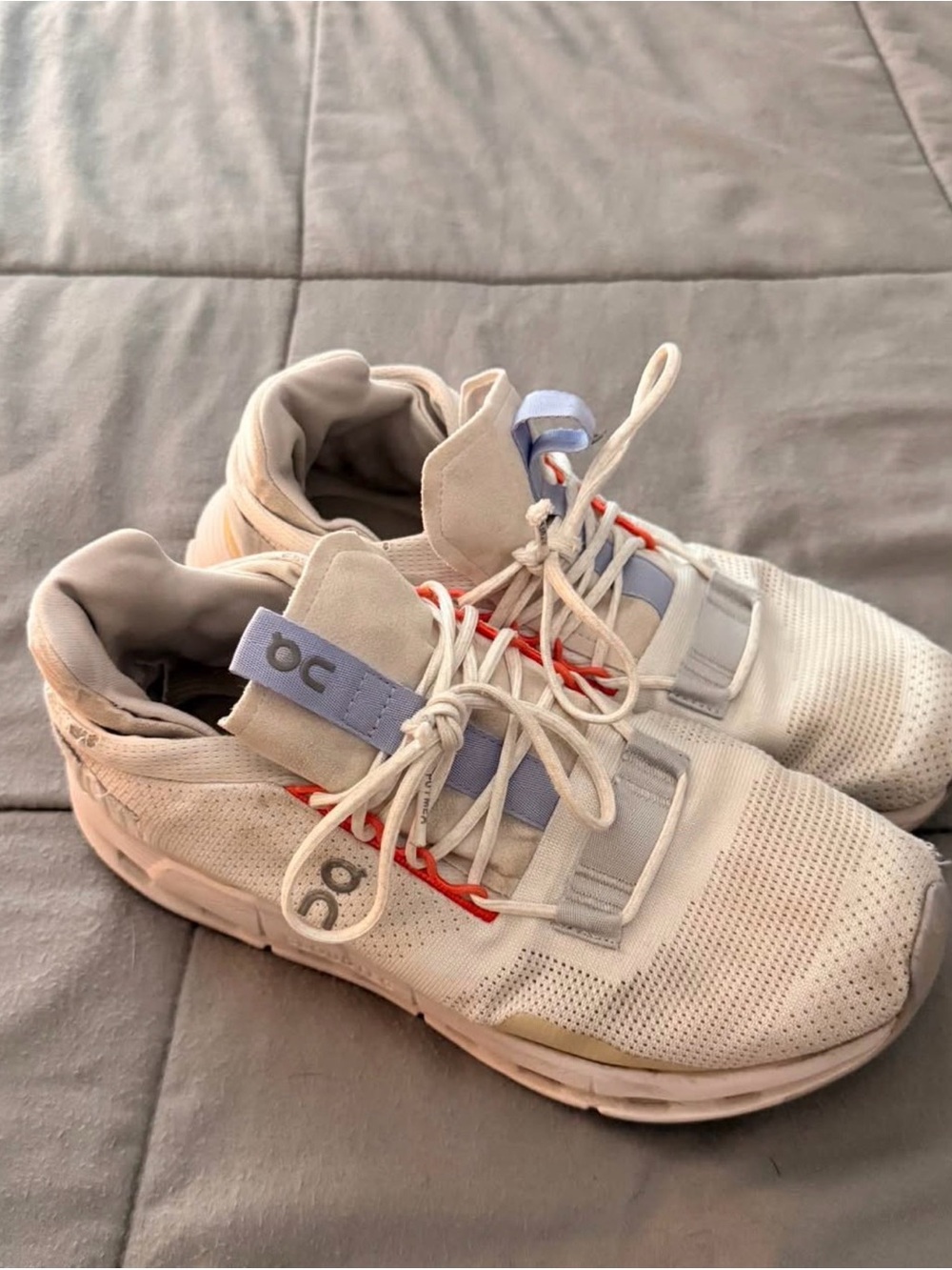 On Running Kids White Sneakers with Light Blue and Orange Accents